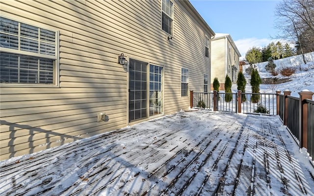 view of snow covered deck