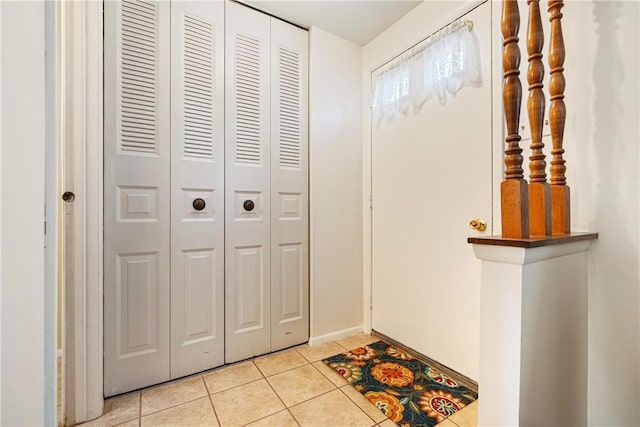 view of tiled foyer entrance