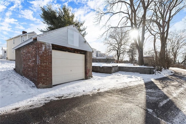 view of snow covered garage