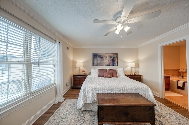 bedroom featuring ensuite bathroom, ceiling fan, crown molding, and multiple windows