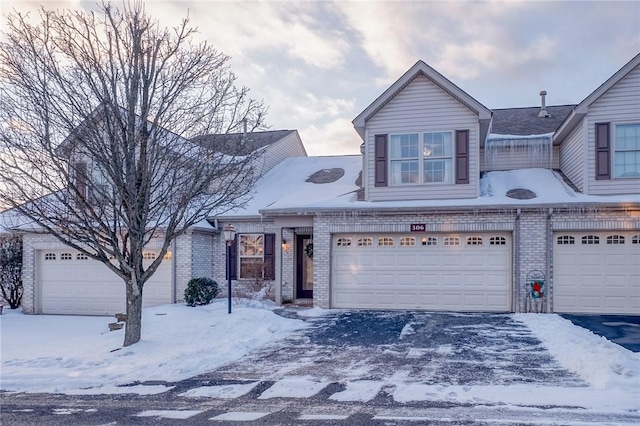 view of front of property with a garage