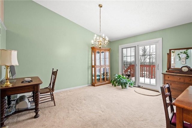 carpeted office featuring vaulted ceiling and a notable chandelier