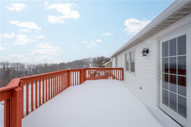 view of snow covered deck