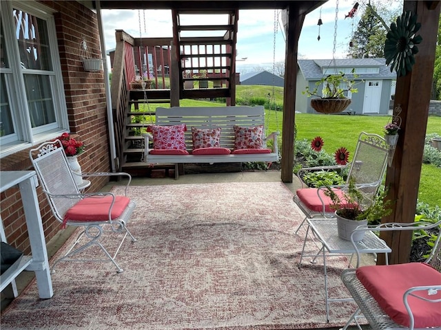 view of patio featuring an outdoor structure