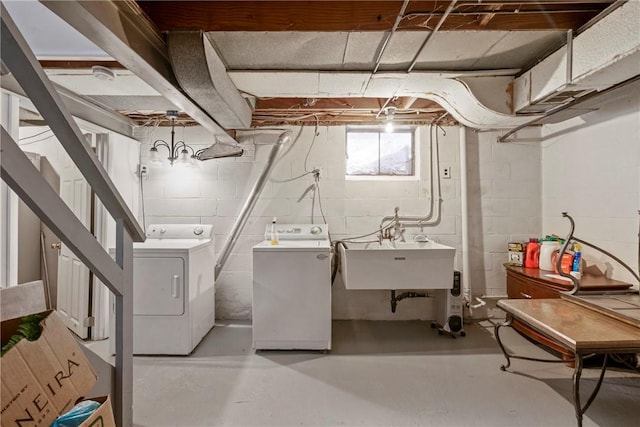 laundry room featuring washer and dryer and sink