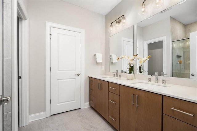 bathroom with vanity and an enclosed shower