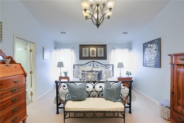 carpeted bedroom featuring a notable chandelier