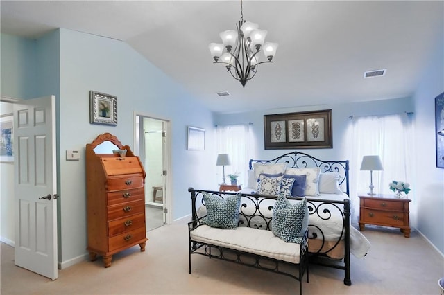 bedroom with vaulted ceiling, ensuite bath, light colored carpet, and a notable chandelier