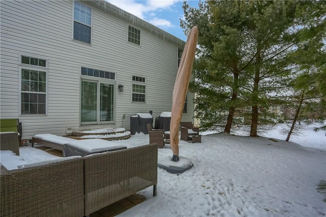 view of snow covered house