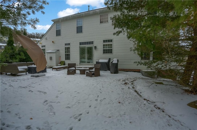 view of snow covered house