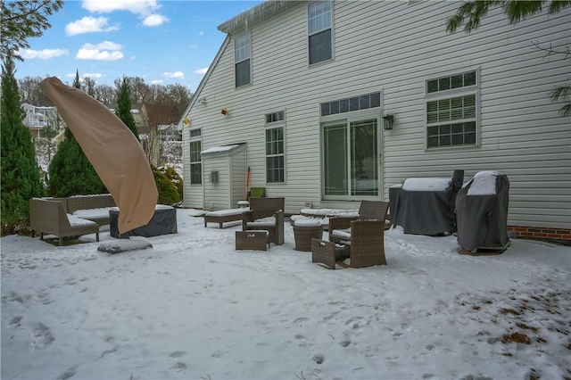 view of snow covered house