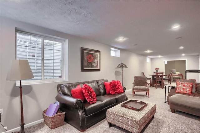 living room featuring light colored carpet