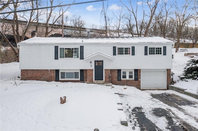 split foyer home featuring a garage