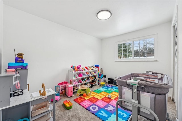 recreation room with carpet floors