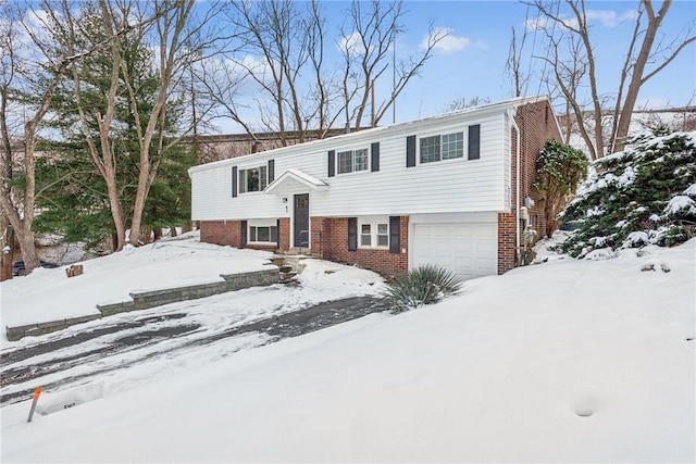 bi-level home featuring a garage