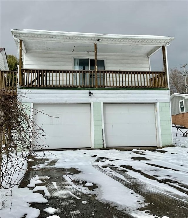 view of snow covered garage