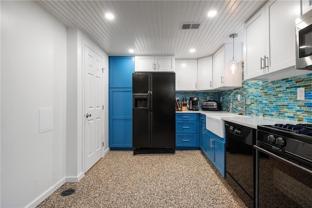 kitchen featuring blue cabinets, decorative light fixtures, white cabinets, tasteful backsplash, and black appliances