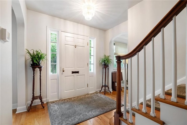 entryway with light hardwood / wood-style flooring