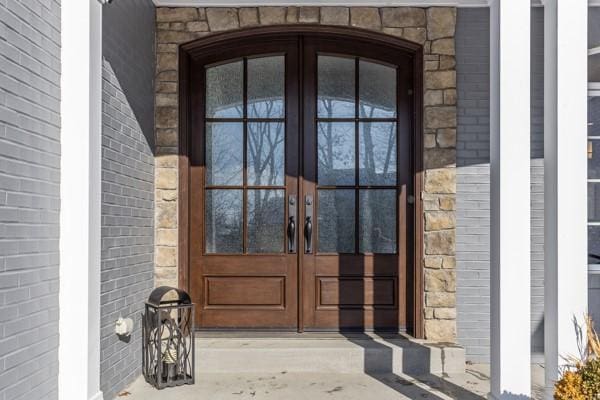 doorway to property featuring french doors