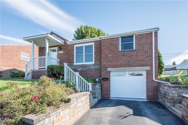 view of front of home with a garage