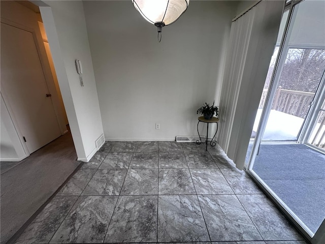 view of unfurnished dining area