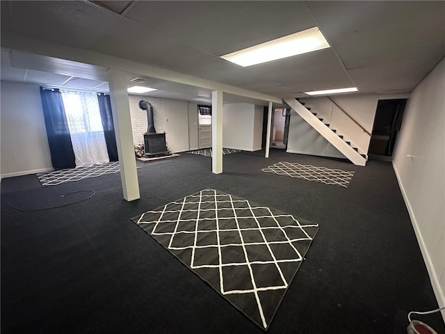 basement with dark colored carpet