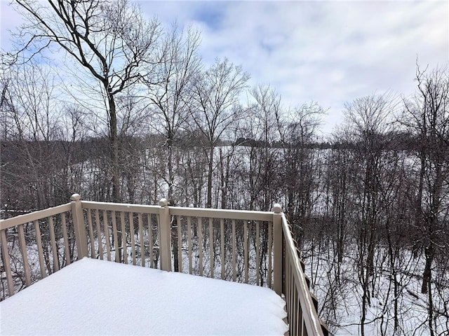 view of snow covered deck