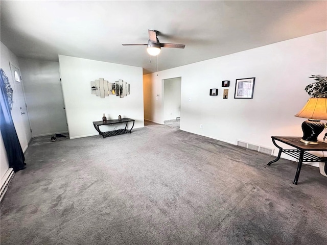 unfurnished living room with carpet flooring and ceiling fan