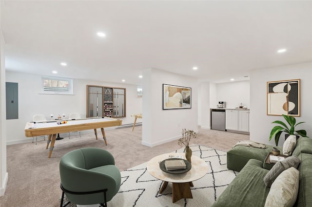 carpeted living room featuring electric panel and baseboard heating