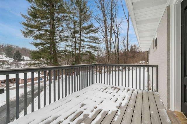 view of snow covered deck