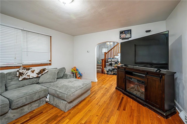 living room with light hardwood / wood-style floors