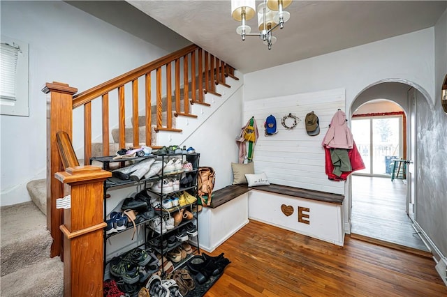 interior space with dark hardwood / wood-style flooring and a chandelier