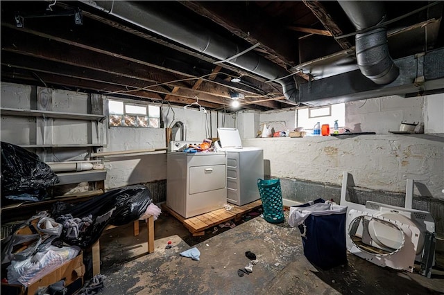 basement featuring washing machine and dryer and plenty of natural light