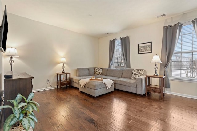 living room featuring dark hardwood / wood-style floors