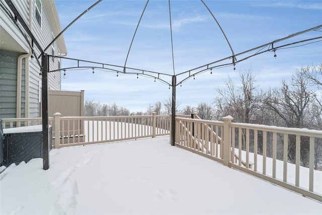 view of snow covered deck