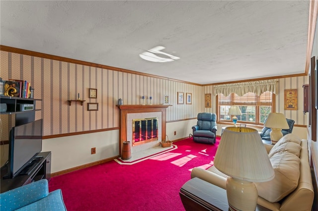 carpeted living room featuring a fireplace, a textured ceiling, and crown molding