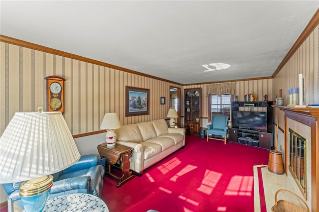 carpeted living room with ornamental molding and a high end fireplace