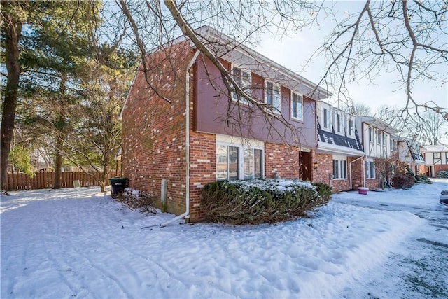 view of snow covered property