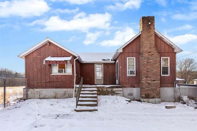 view of front of house featuring cooling unit