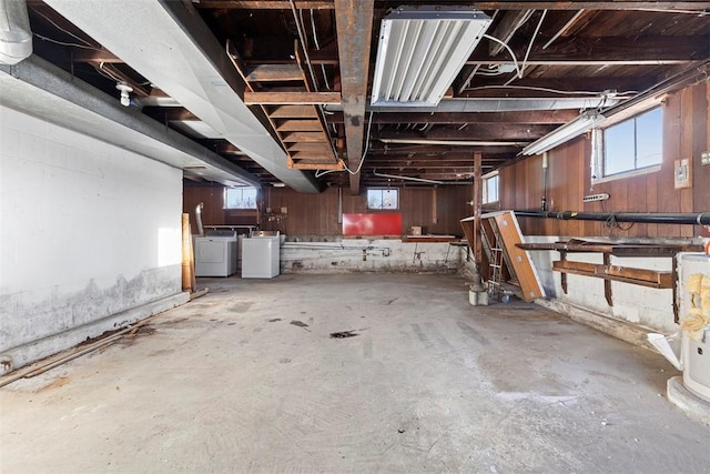 basement featuring washer and clothes dryer