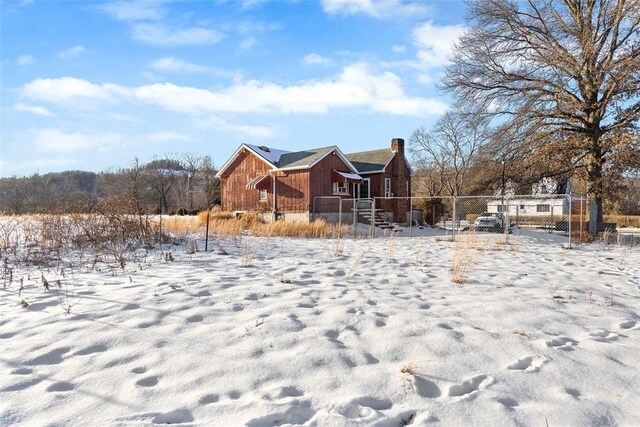 view of snow covered property