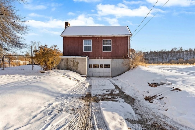 exterior space with a garage