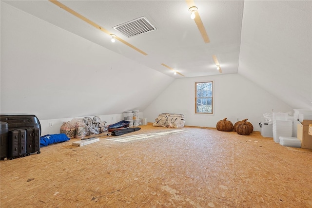 bonus room featuring vaulted ceiling