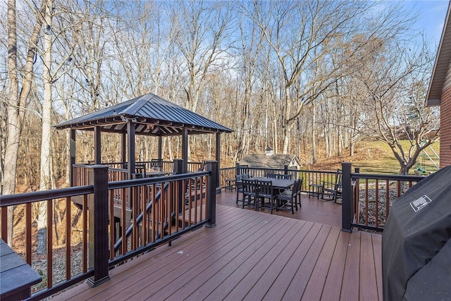 deck with a gazebo and area for grilling