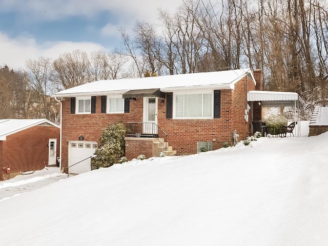 view of front of property with a garage