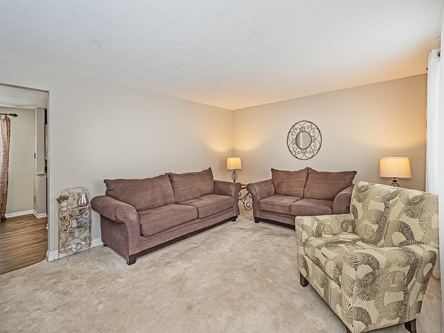 living room featuring light colored carpet