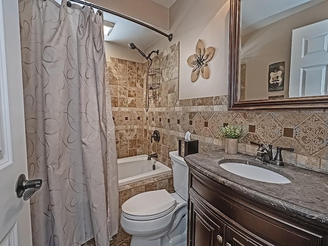 full bathroom featuring shower / bath combination with curtain, vanity, and toilet