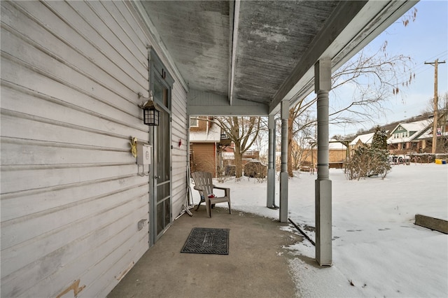 view of snow covered patio