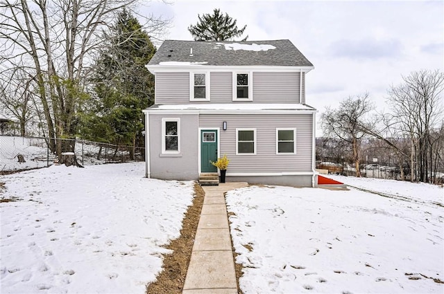 view of snow covered property