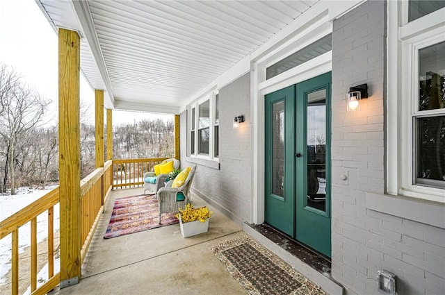 exterior space featuring french doors and a porch